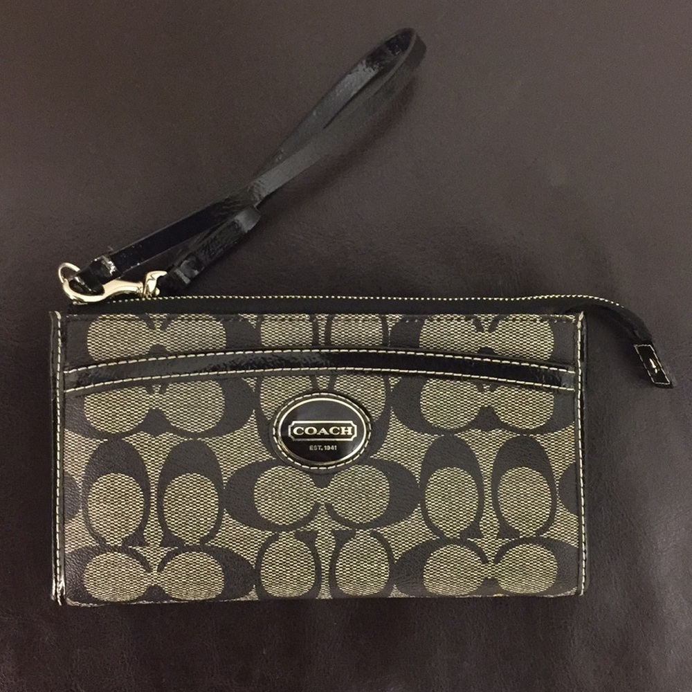 Coach Monogramed black and grey leather wristlet